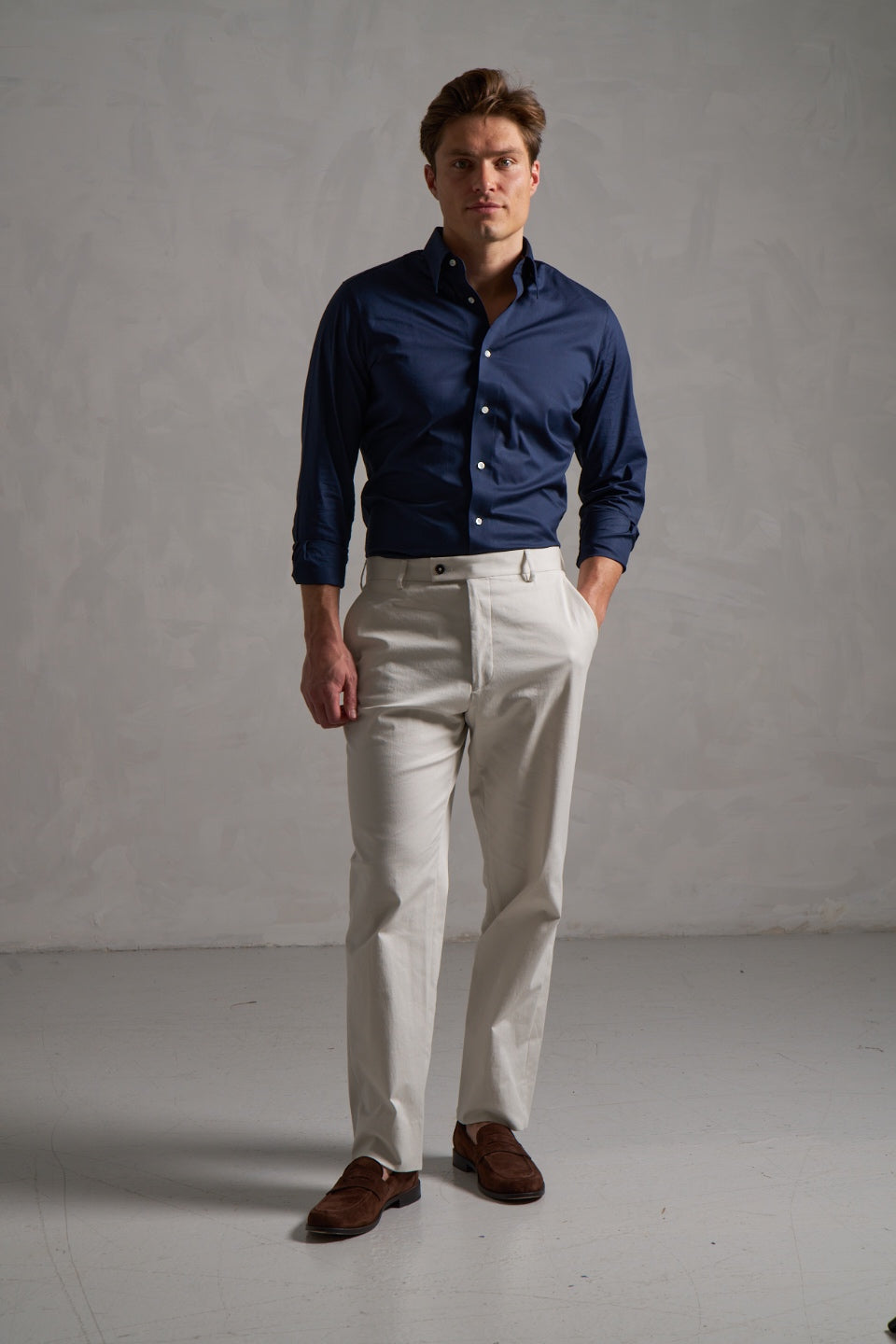 Navy shirt with cream linen trousers