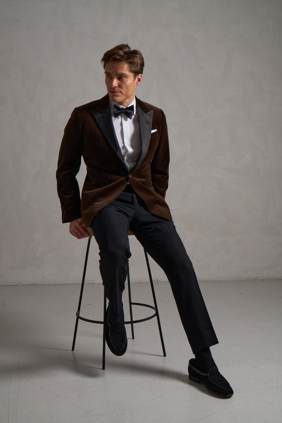 Brown velvet tuxedo jacket, seated