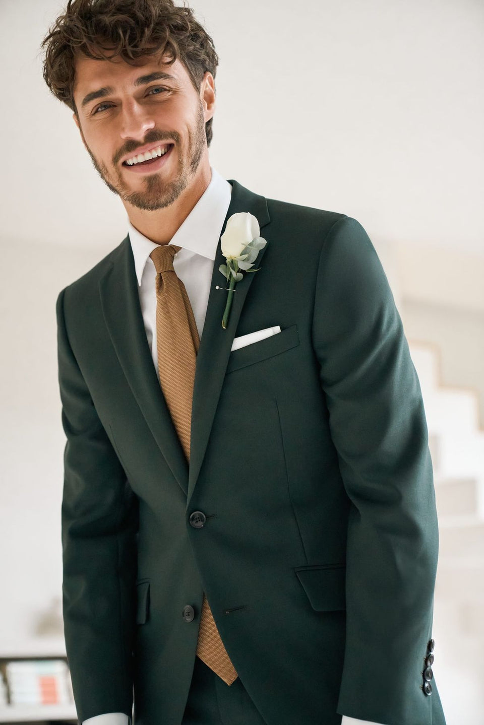 Groom in a green made-to-measure wedding suit – Manchester