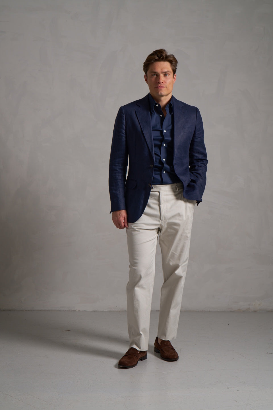 Navy linen jacket with a green linen shirt