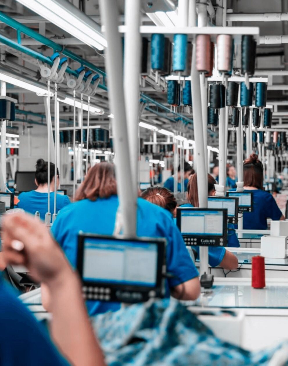 Garment production line with sewing stations