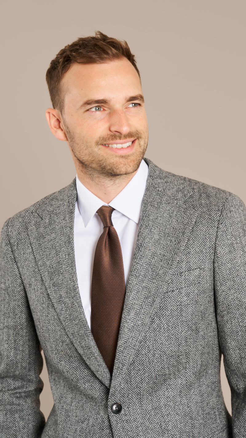 Holland & Sherry Mid Grey Herringbone Tweed Suit