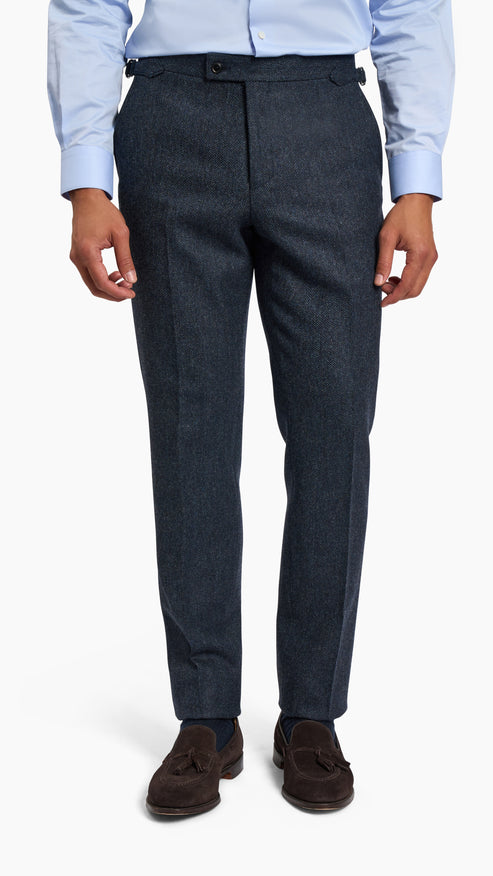 Abraham Moon Navy Tweed Suit trousers in textured navy wool styled with a light blue shirt and brown loafers.