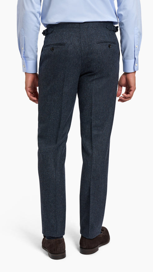 Abraham Moon Navy Tweed Suit trousers shown from back with textured navy wool fabric and buttoned pockets.