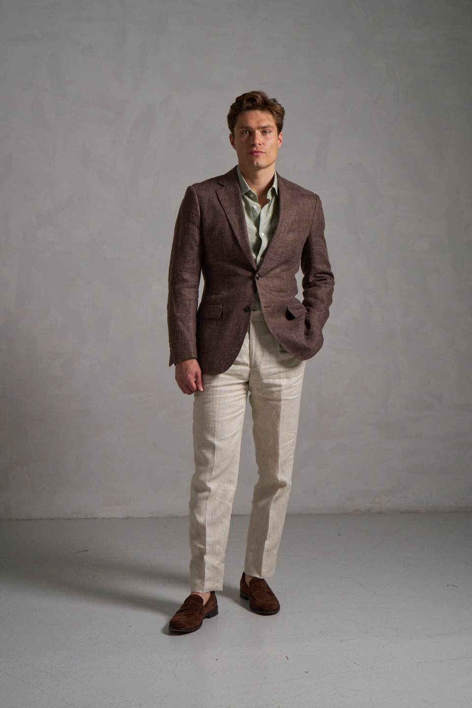 Brown linen jacket with cream linen trousers