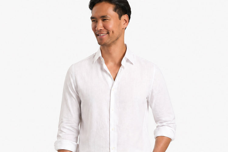Man wearing a white dress shirt on a white background